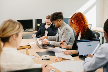 Business people working together in modern office meeting