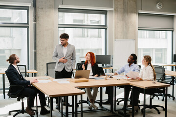 Business people working together in modern office meeting room