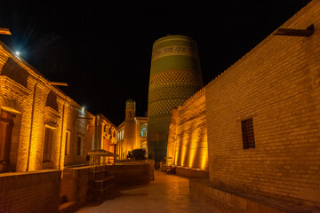 Night view of the Kaltaminor Minaret in the Itchan Kala of Khiva,  Uzbekistan