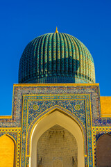 Gate of Amir Temur Gur e Amir Mosque in Samarkand, Uzbekistan.  Translation: in the name of Allah Almighty who creates