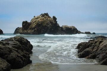 waves crashing on rocks