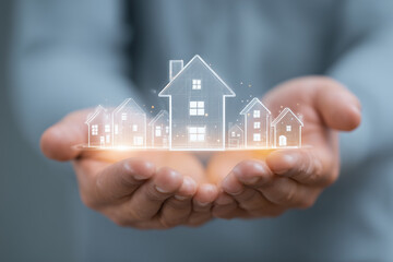 Real estate concept houses in open hands