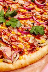 juicy pizza with sauce and salami