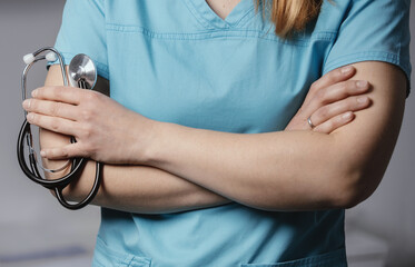 Medicine. Doctor holds his stethoscope to insinuate that it's time for a check up, professional emergency healthcare assistance service concept. Professional doctor ready to listen lungs or heart.