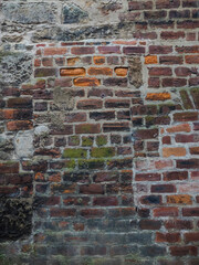 Old brick wall with red bricks