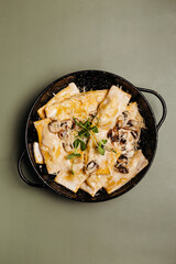 a dish in a restaurant on an olive background