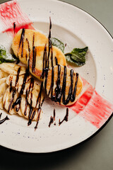 a dish in a restaurant on an olive background