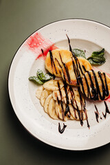a dish in a restaurant on an olive background