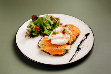 a dish in a restaurant on an olive background