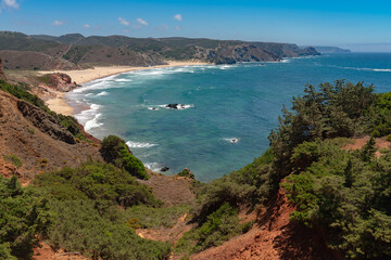 Landscape of the Amado beach since lookout in a sunny day, Carrapateira, Portugal.