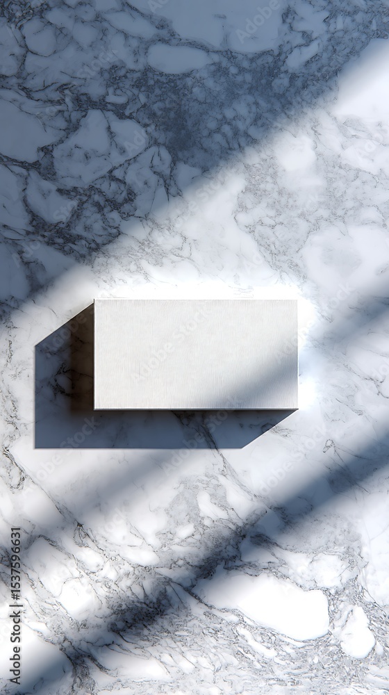 Aufkleber white textured box casting shadow on a marble surface with dappled light from overhead branches