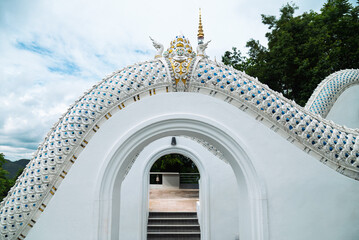 The beautiful Phra That Si Mueang Pong Pagoda Temple. White Castle or White Pagoda on the mountain at Wat Aranyawas Temple, Ban Pong, Hang Dong District Chiang Mai Thailand. Travel attraction