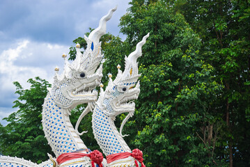 White Naga statue (Loha Prasat Phra That Si Mueang Pong) at Wat Aranyawat, Chiang mai, Northern Thailand.