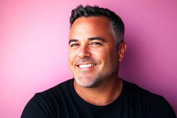 Fototapeta premium Purple solid background. Idea of style for aging men. Trendy men's high and tight haircut - midlife white man with black hair. A cheerful man radiating warmth and positivity.
