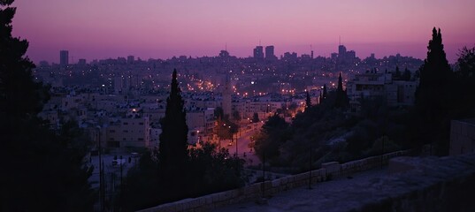 Naklejka premium A cinematic still of the cityscape of Jerusalem at night, with a purple sky