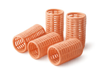 Orange hair rollers arranged on clear surface, preparing voluminous curls with professional styling tools