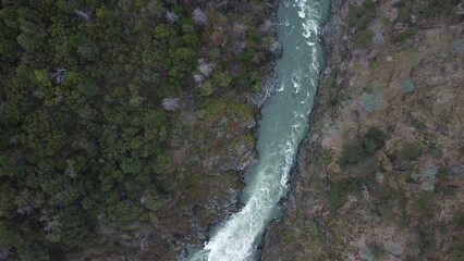 Drone Shot of Rapid River in Rugged Wilderness
