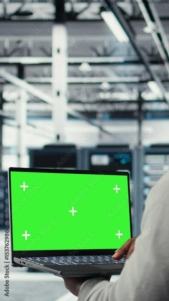 Poster vertical video data center admin using isolated screen laptop to monitor neural network ai. server r