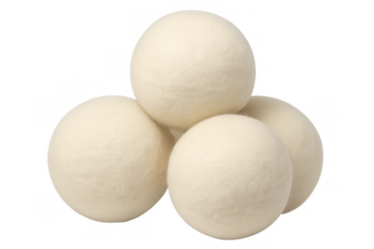 Wool dryer balls stacked pyramidal, handcrafted from natural fibers, providing sustainable fabric softening solution against neutral backdrop