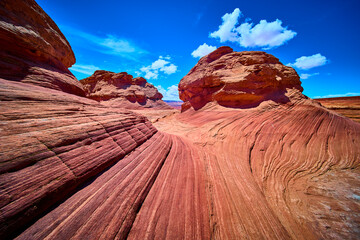Red Sandstone Ridges and Curved Canyon Walls with Blue Sky Arizona Daylight