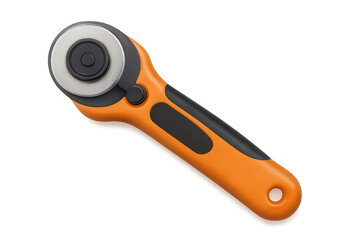 Obraz premium Orange rotary cutter isolated on transparent background, perfect for quilting, sewing, and crafting projects
