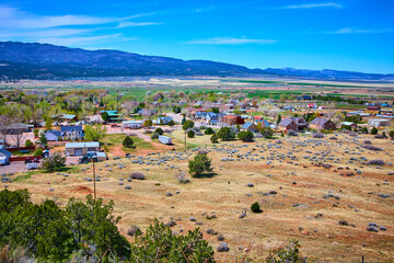 Rural High Desert Town Fields and Mountains Aerial Fly Over
