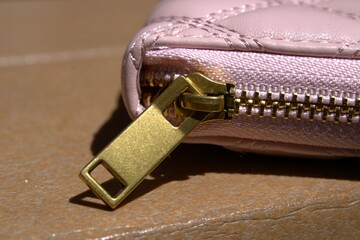 leather pink wallet with beige interior