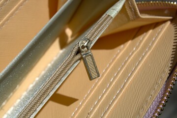 leather pink wallet with beige interior