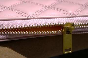 leather pink wallet with beige interior