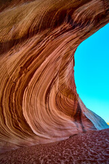 Sandstone Wave Motion and Canyon Walls with Sandy Floor Low Angle Perspective
