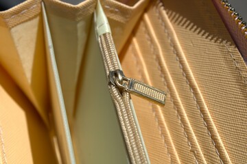 leather pink wallet with beige interior