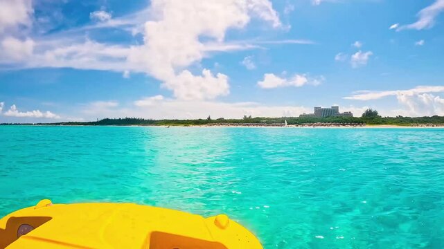 Blue crystal clear Atlantic ocean water on sunny day,  pedal boat panoramic view of Varadero Beach