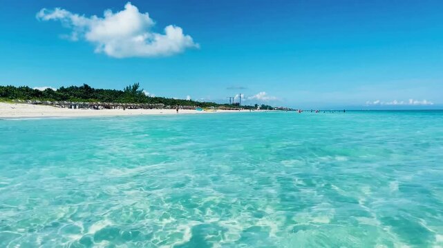 Peaceful transparent blue ocean water blending with vast blue sky, Varadero, Cuba
