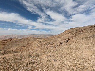 Jordan Trail long distance hiking from Dana Valley to Petra and Wadi Rum.Wadi Rum Desert, Jordan. The red desert and Jabal Al Qattar mountains,Arabia
