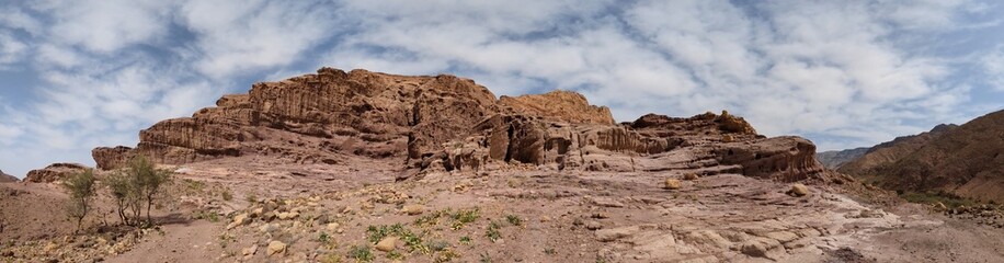 Jordan Trail long distance hiking from Dana Valley to Petra and Wadi Rum.Wadi Rum Desert, Jordan. The red desert and Jabal Al Qattar mountains,Arabia