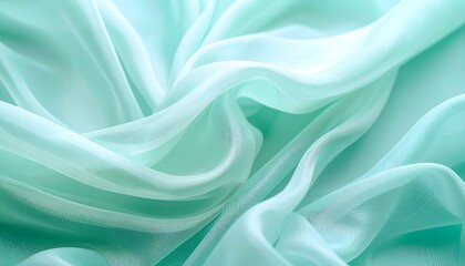 Obraz premium Translucent mint green organza with light diffusion, soft ethereal background