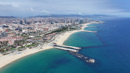 Barceloneta Beach At Barcelona In Catalonia Spain. Stunning Cityscape. Beach Landscape. Highrise Buildings. Barceloneta Beach At Barcelona In Catalonia Spain. Nature Background.