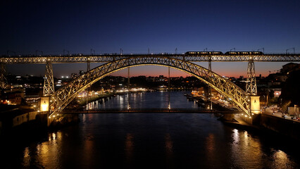 Sunset Luis I Bridge At Porto In Porto District Portugal. Sunset City Scene. Illuminated Bridge...