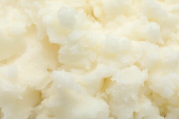 Texture of organic shea butter as background, top view