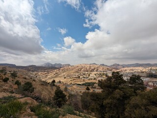 Jordan Trail long distance hiking from Dana Valley to Petra and Wadi Rum.Wadi Rum Desert, Jordan. The red desert and Jabal Al Qattar mountains,Arabia