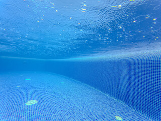 Underwater view of the pool mosaic tile and water jets