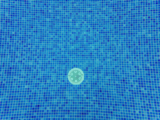 Underwater view of the pool mosaic tile and water jets