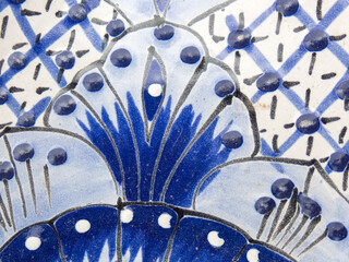 Talavera ceramics showcase intricate blue designs in a vibrant craftsmanship tradition