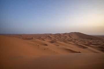 Sunset panoramic landscape views of Erg Chebbi sand dunes located in Morocco on the western edge of the Sahara Desert