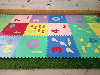 Colorful floor carpets. with number motifs. Carpets with number motifs are generally in the form of...
