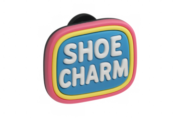 Vivid rectangular shoe charm displaying bold lettering, gleaming with colorful design against transparent backdrop