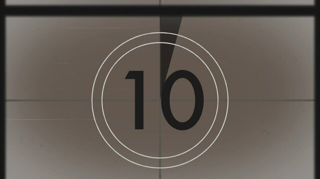 Fading blank gray field into film countdown leader on slate, counting down and displaying END FILM