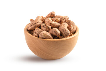 Bowl of cashew with shell isolated on white background.