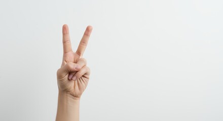 Hand making peace sign gesture