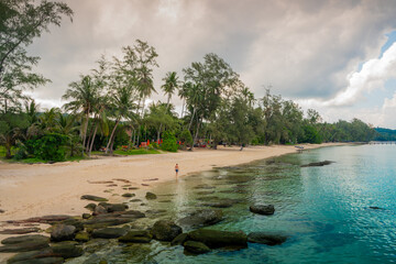 Beautiful tourist attractions Beach Koh Kood Island Thailand Trat, tropical beach with palm trees and a turqouse colored ocean on a sunny day, Ko Kut Island with coconut palm trees on the beach,Travel